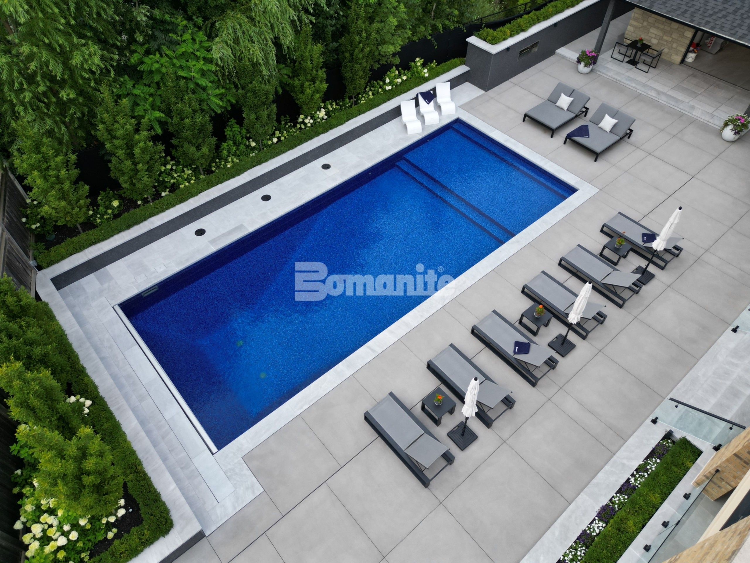 Bomanite imprinted concrete pool deck with exposed sandscape refined finish