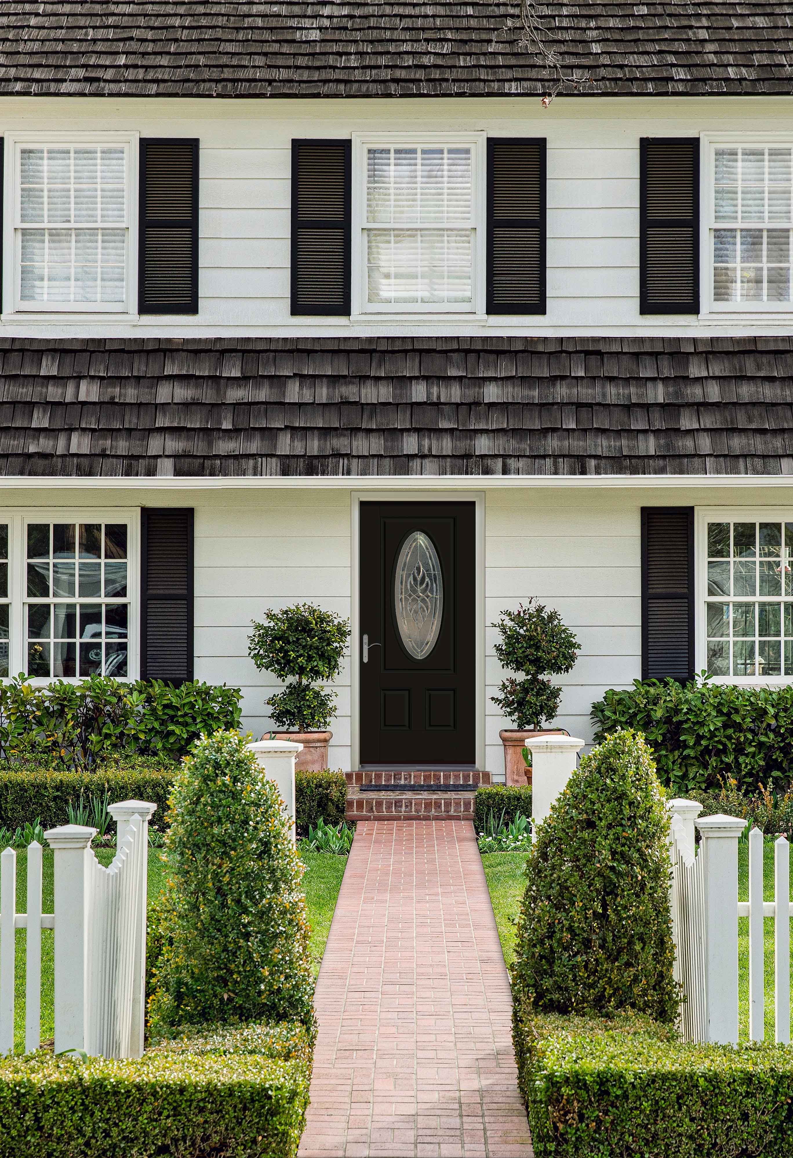 Pella full-house patio door package opening to a green backyard